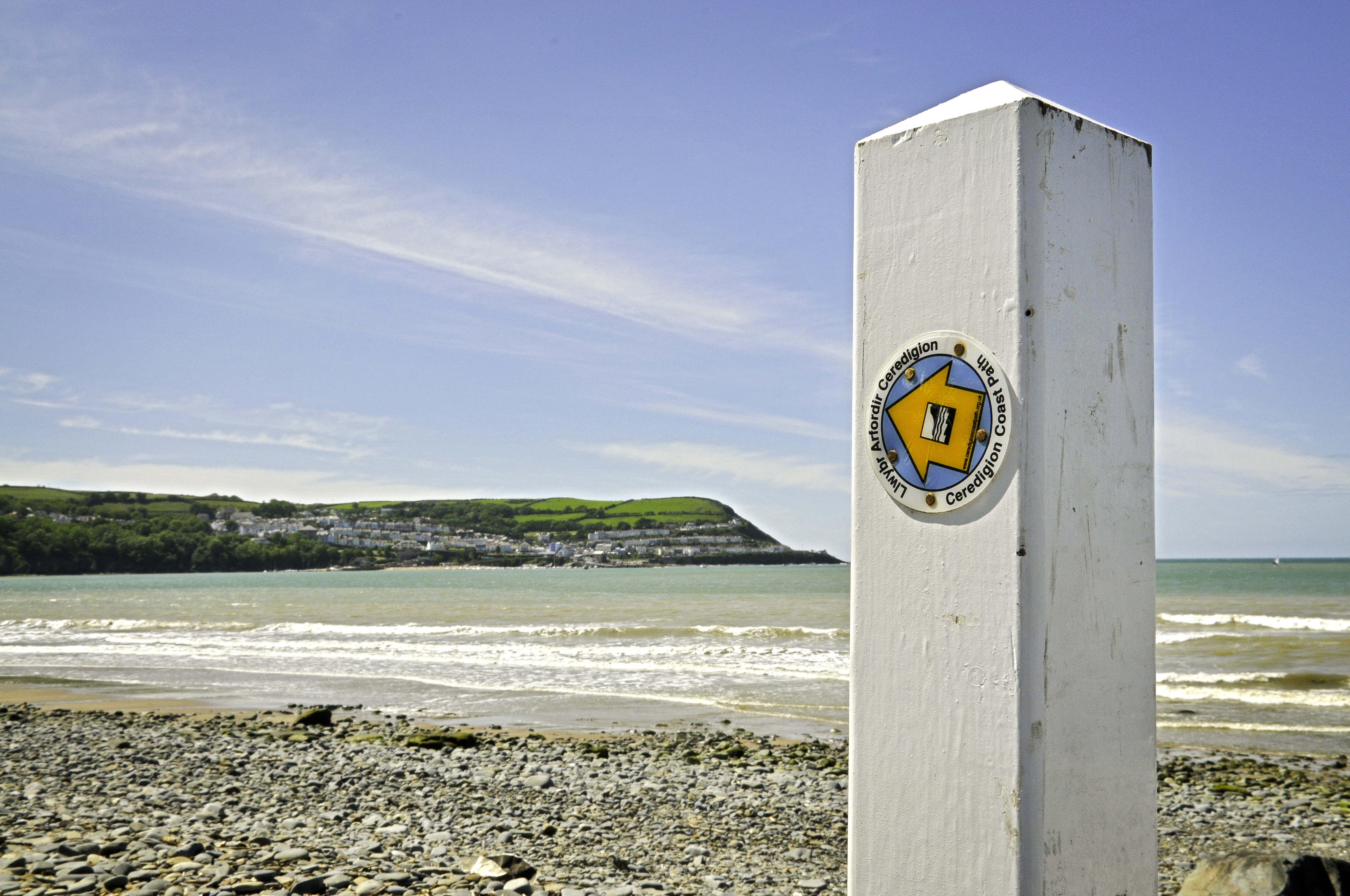 New Quay beach with sign post